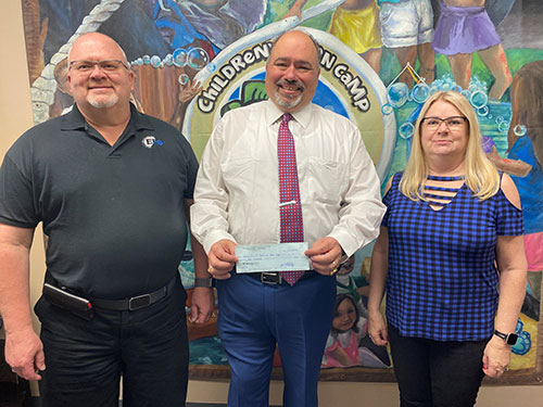 Check Presentation from The Order of the Blue Goose Pictured Left to right, Ron Kern , Dominic Mantuano, Cristine Kern