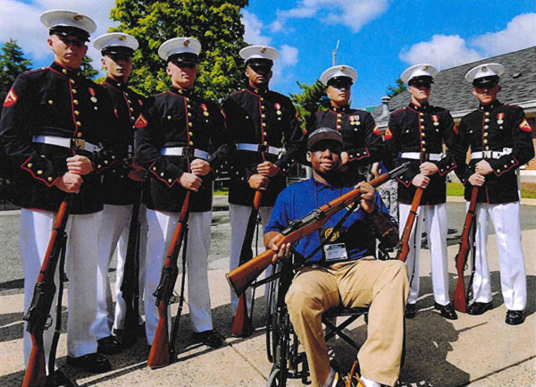 Christopher Etienne with Marines